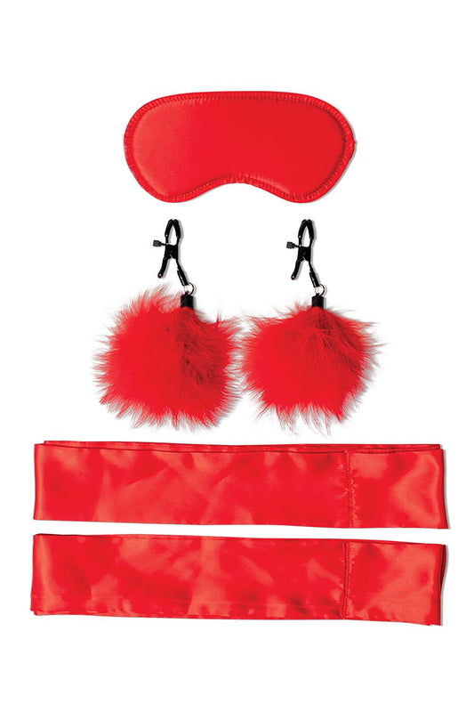 Zijaanzicht van het rode bondage beginners set met handboeien, blinddoek en andere accessories