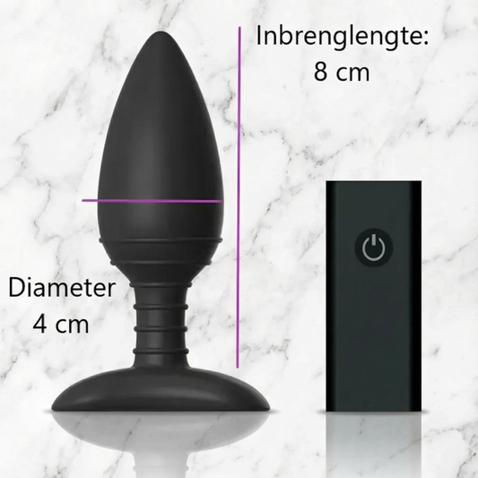 Zijaanzicht van paarse medium buttplug met bijbehorende afstandsbediening voor draadloze bediening