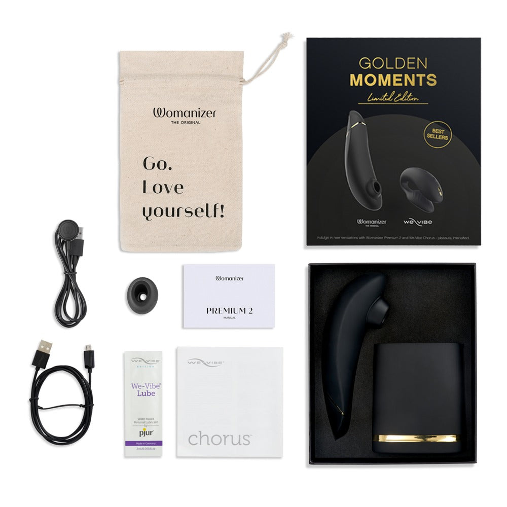Golden Moments giftbox met Womanizer Premium en We-Vibe Chorus op witte achtergrond