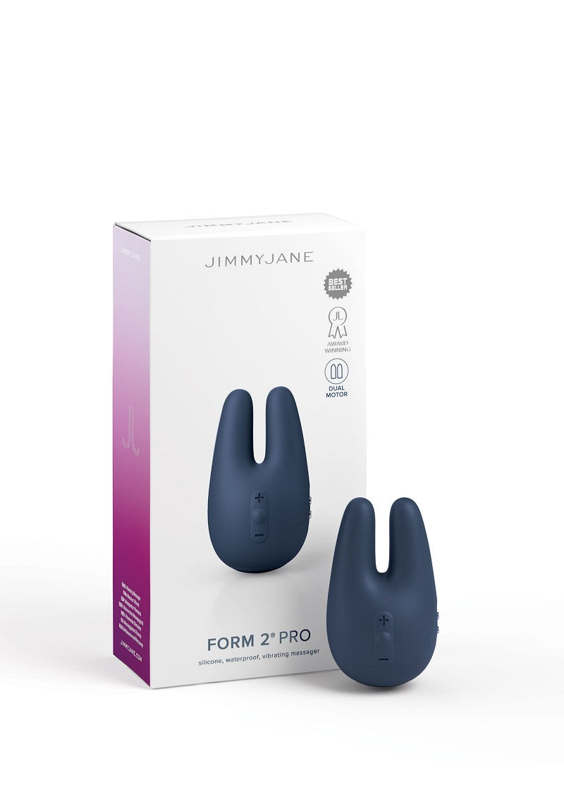 Close-up van bedieningsknoppen op roze Jimmyjane Form 2 intimate wellness product