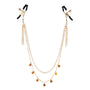 Tepelklemmetjes met goudkleurige ketting en amber steentjes