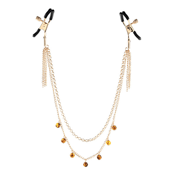 Tepelklemmetjes met goudkleurige ketting en amber steentjes