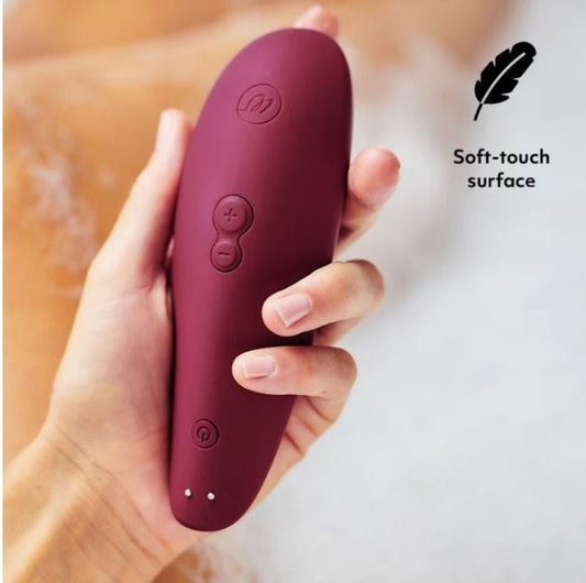 Overzicht Womanizer Classic 2 zwarte variant met volledige accessoire-set en handleiding